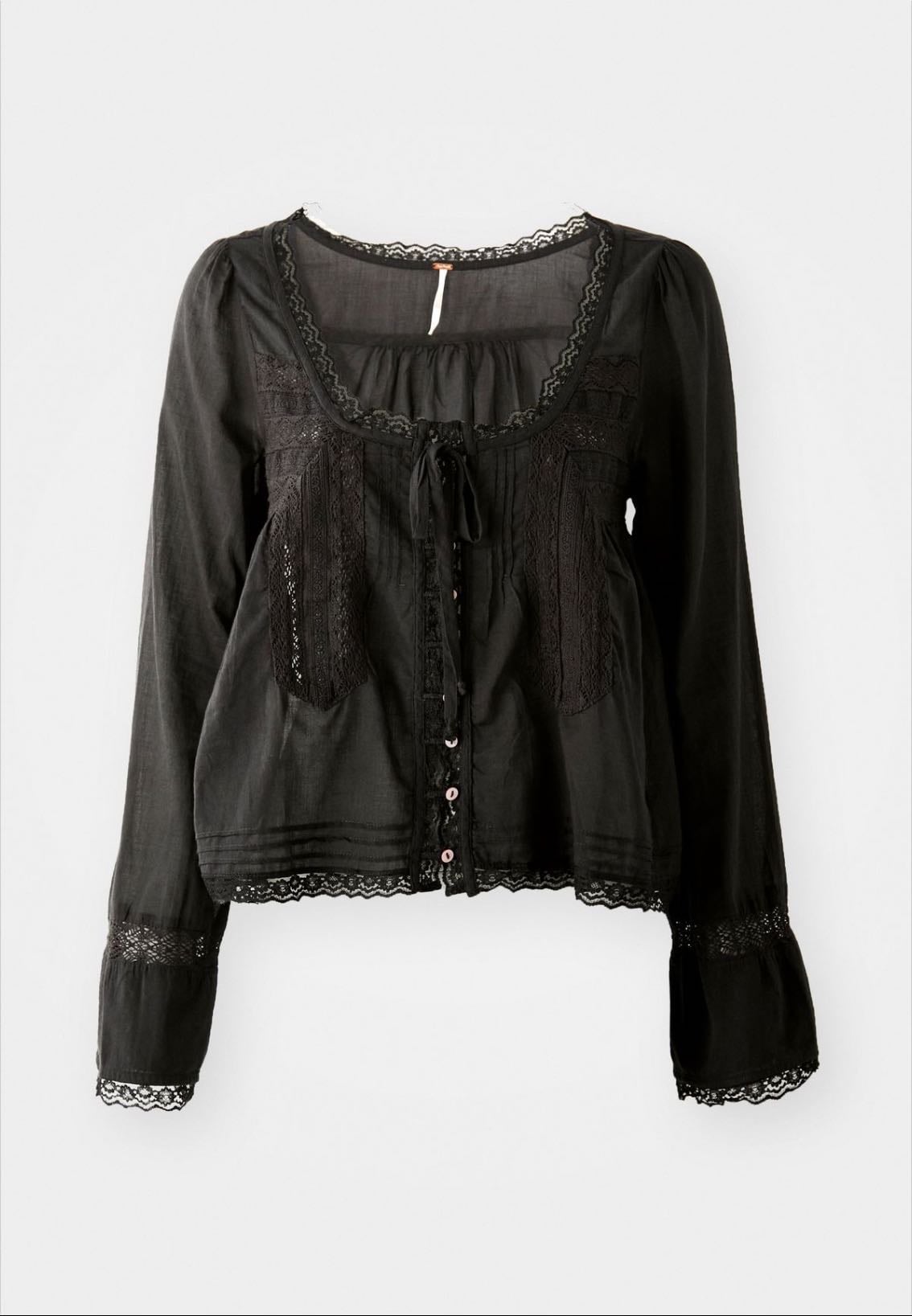 this blouse - so cute and i love the material!! very comfy !!!