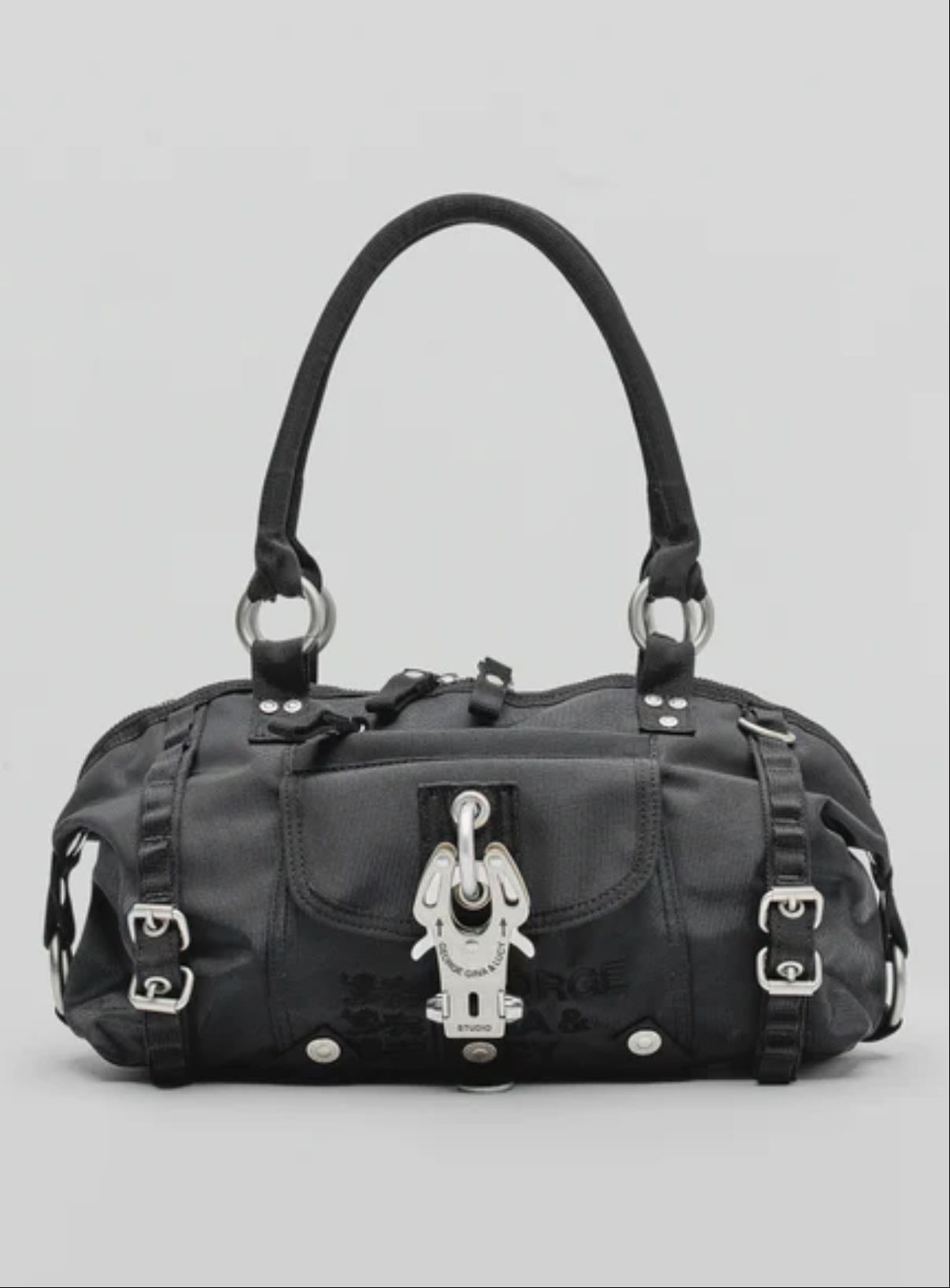 George Gina & Lucy Paradise Angel bag - cute everyday bag & holds so much. a bit heavy but it’s ok. i love her.