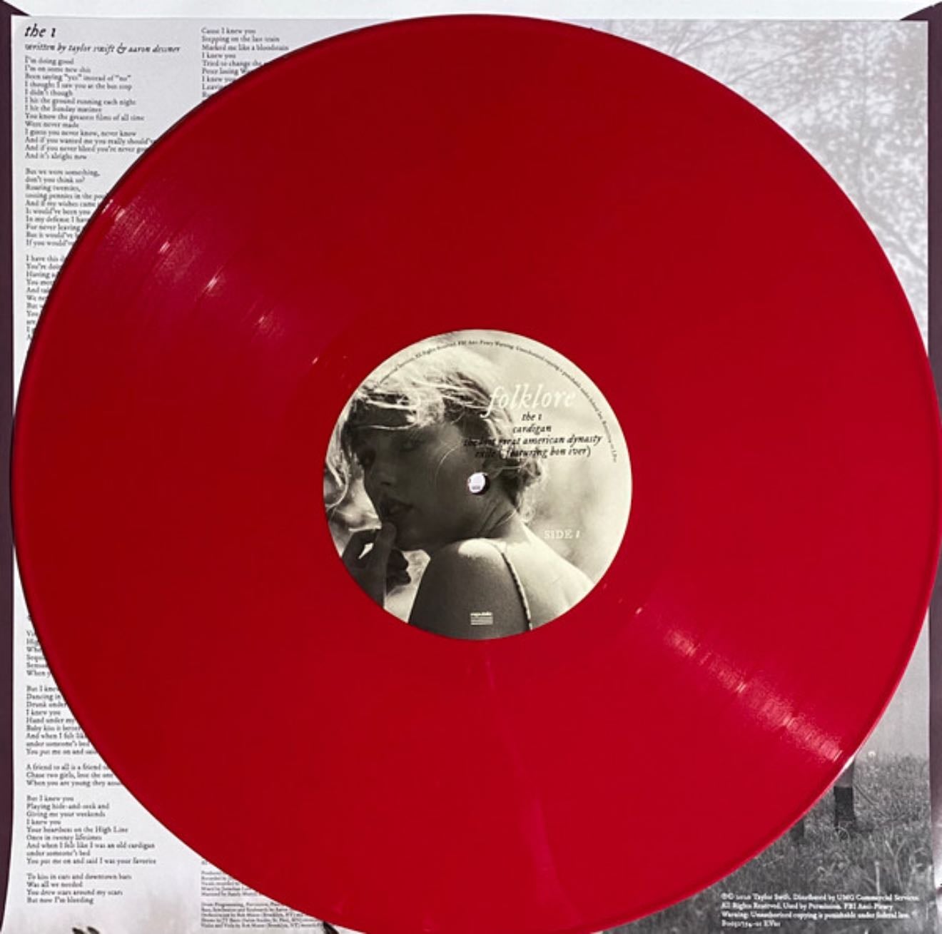 folklore meet me behind the mall red LP - Album · Taylor Swift