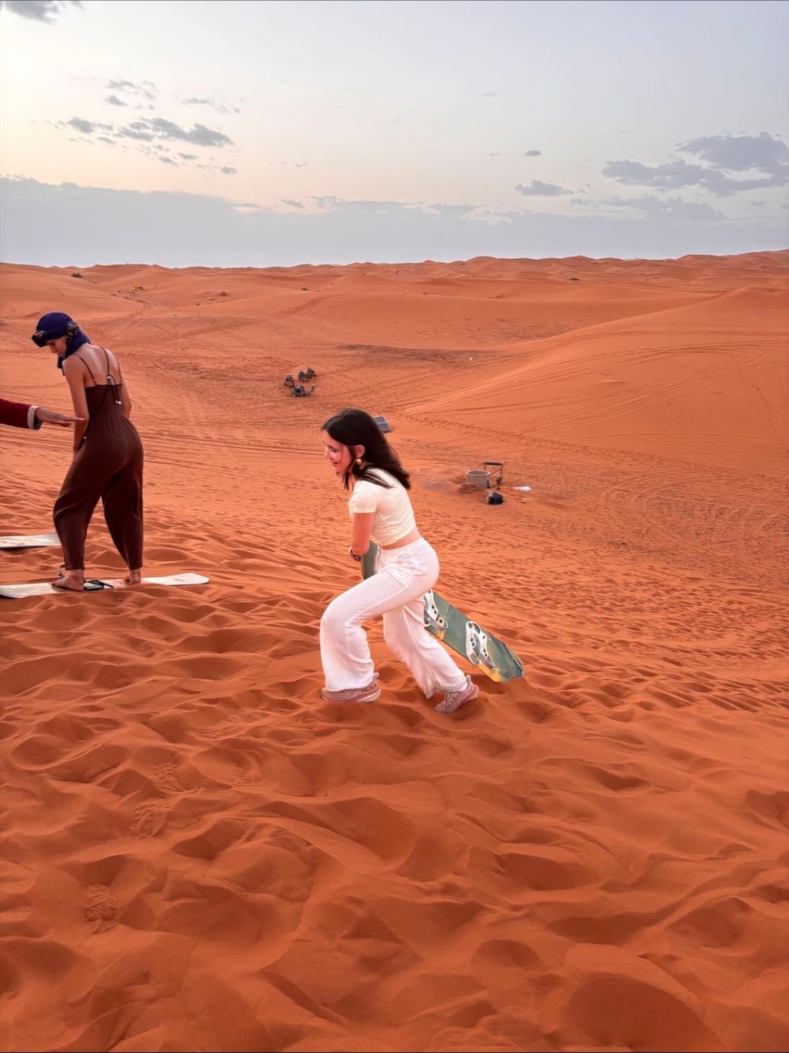 Sandboarding in the Sahara - Glide down golden dunes.