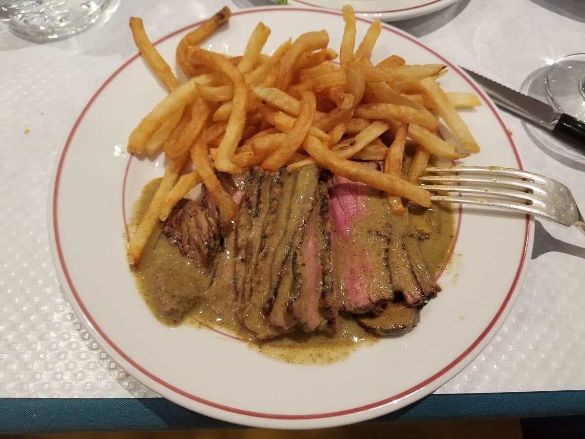 Le Relais de Venise L'Entrecôte - Waiters dressed as French maids serving one dish only: steak frites. Neighborhood: Midtown East.