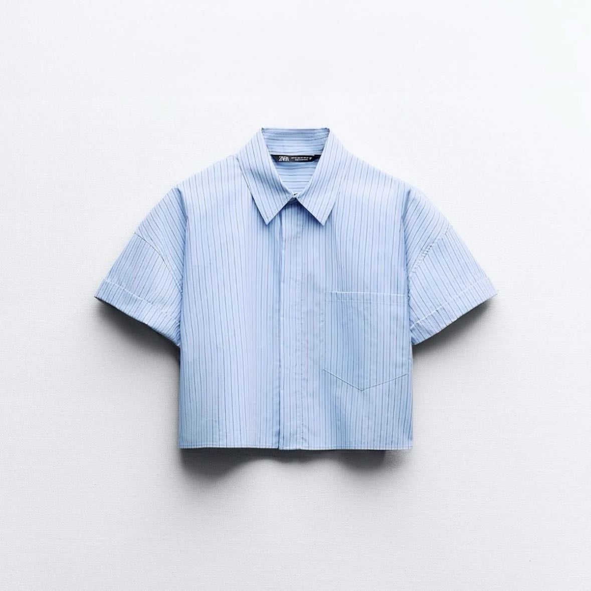 Camisa celeste manga corta
