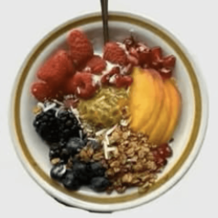 greek yougurt with toppings - blueberry, raspberry, blackberry, flackes, honey and lemon juice