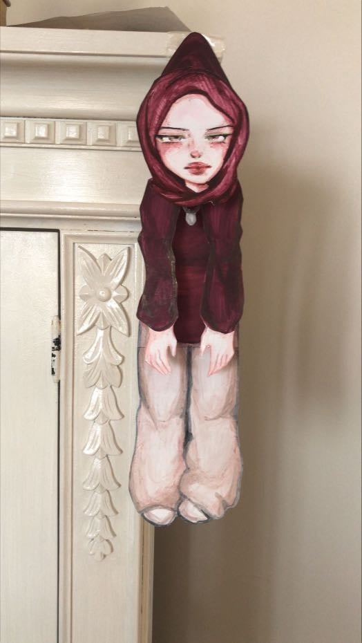 hanging paper doll
