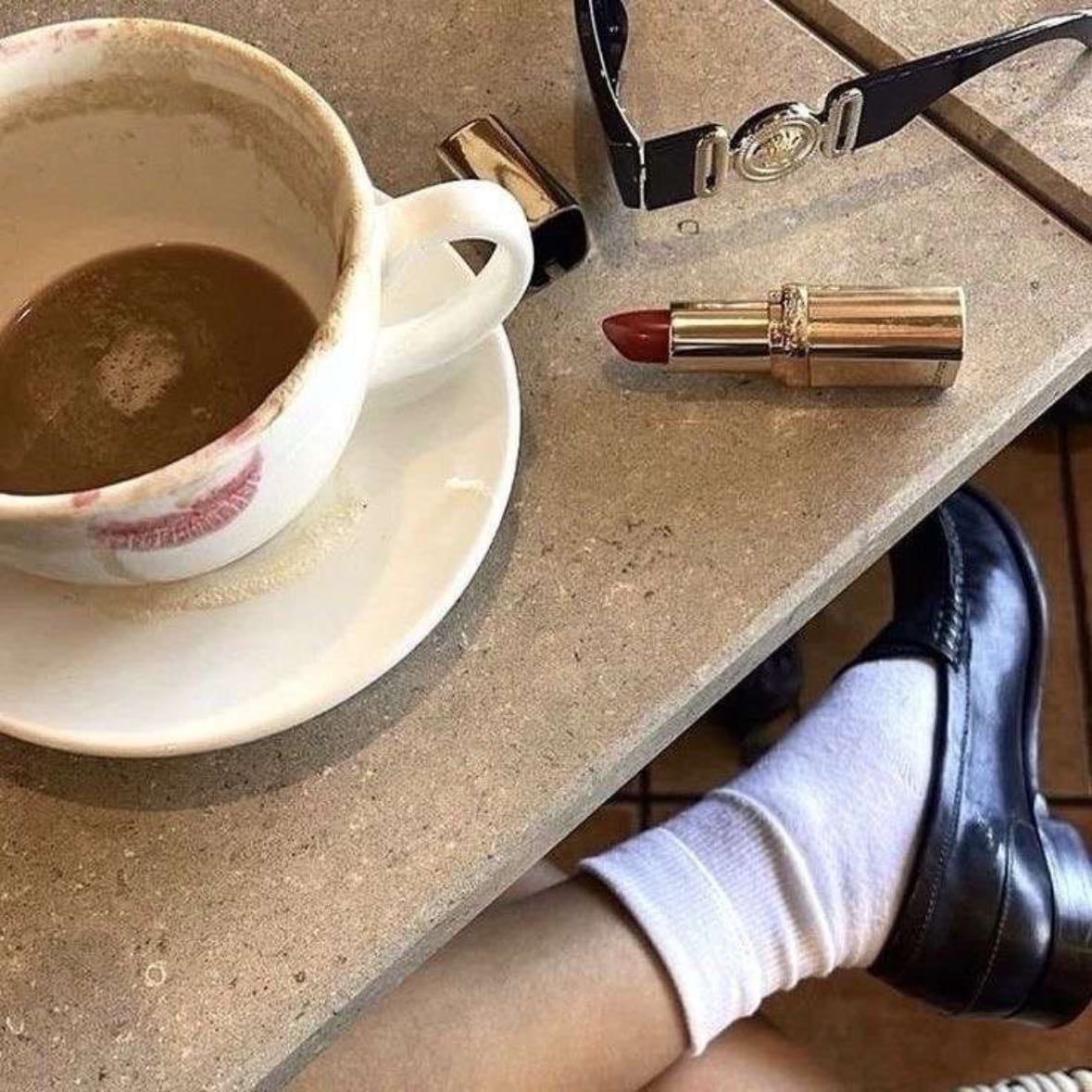 Red lipstick and coffee combo
