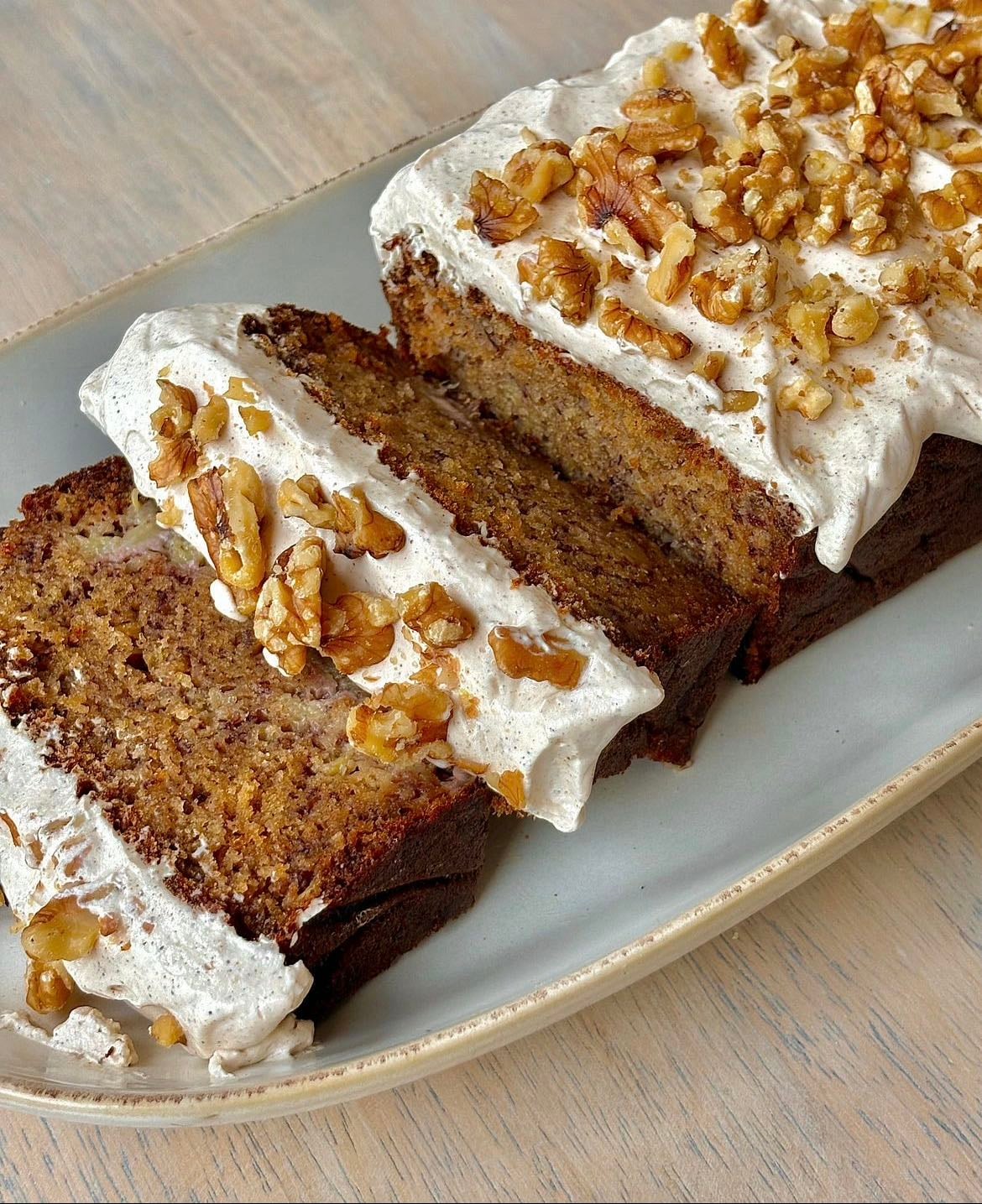 chai-spiced brown butter banana loaf with maple cream cheese frosting.