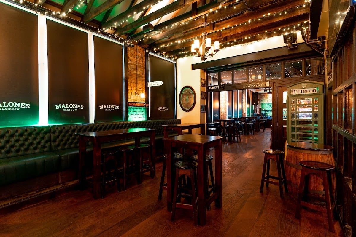 Malones Irish Bar - Very much enjoy, solid rooftop bit too,