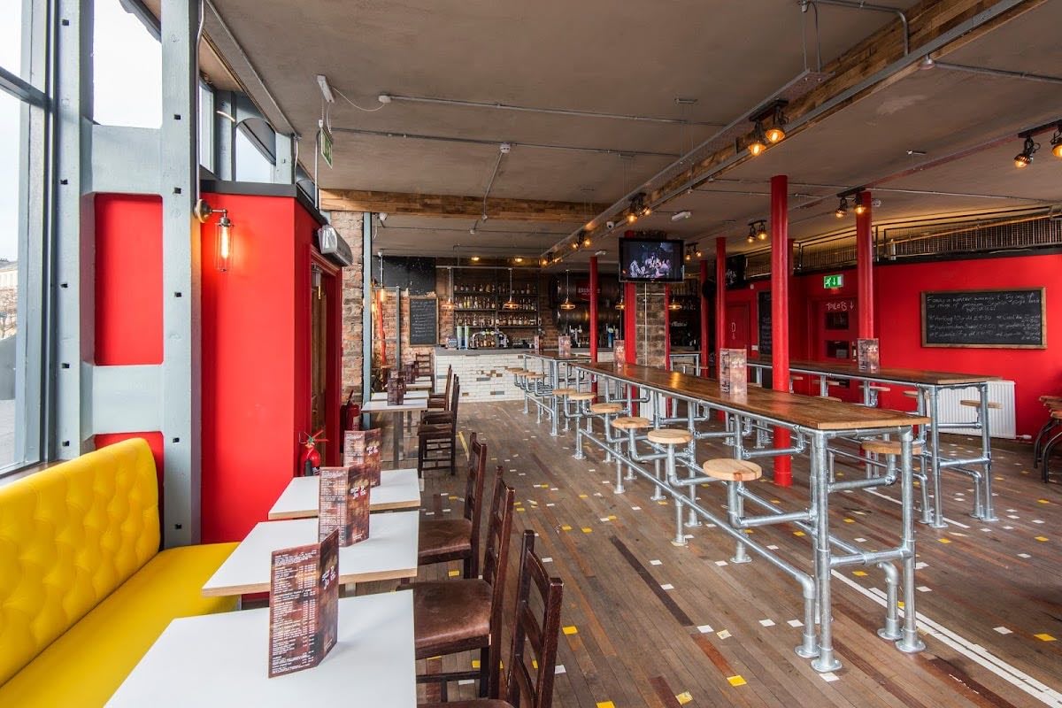 Strip Joint: Pizza Place & Drinkmonger - Quite bookclub but still nice, little record shop inside and red stripe on tap