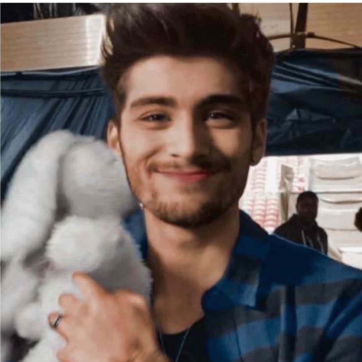 zayn malik - my favourite artist of all time honestly, his songs are so calming, and his voice is beautiful. id love to see him live one day !!