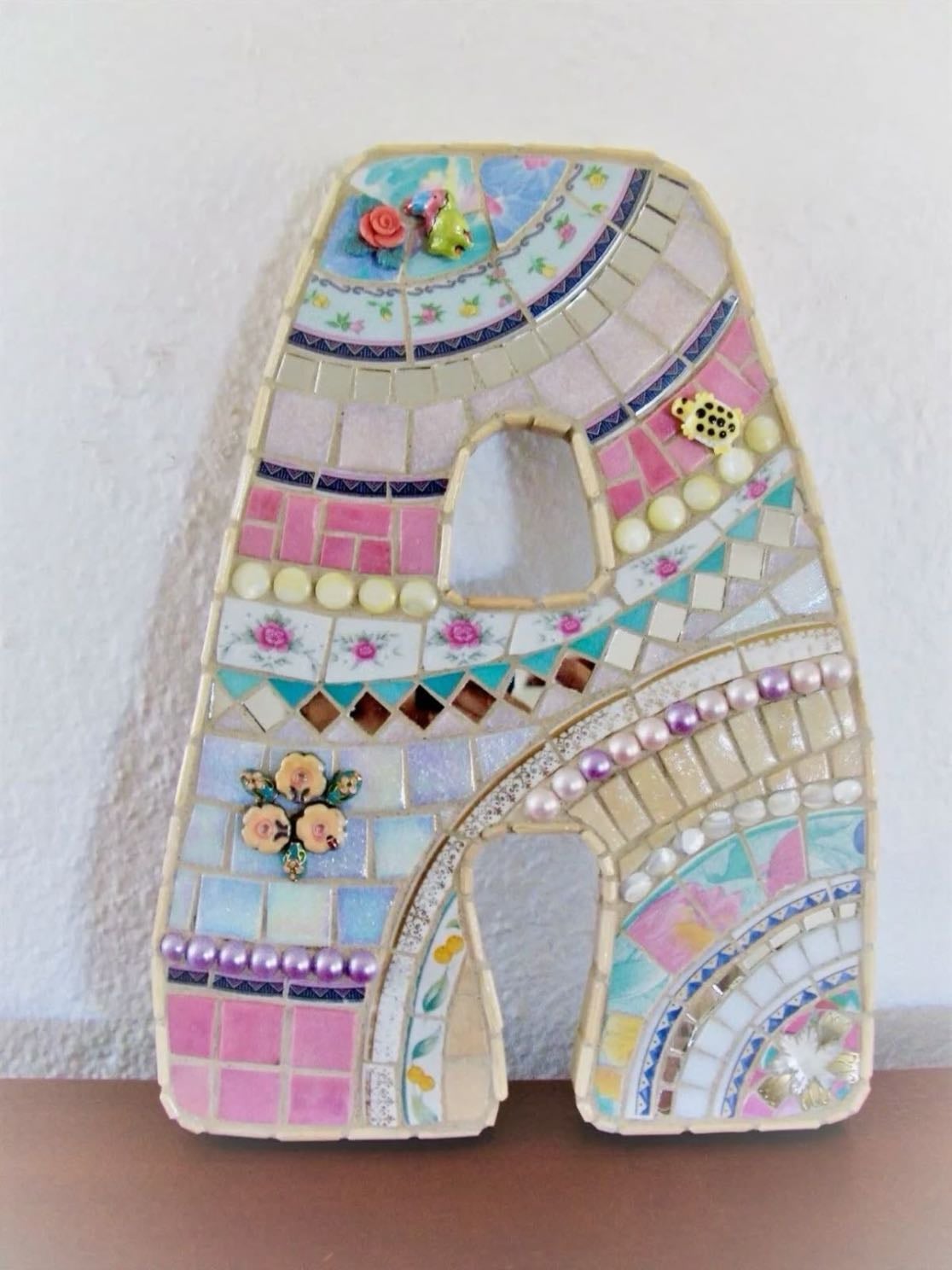 initial in mosaic