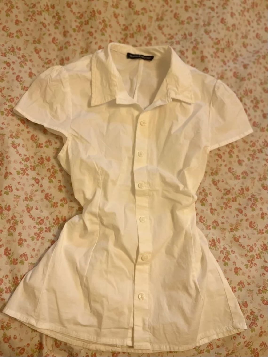 button ups - usually fitted otherwise it would be a normal collared shirt