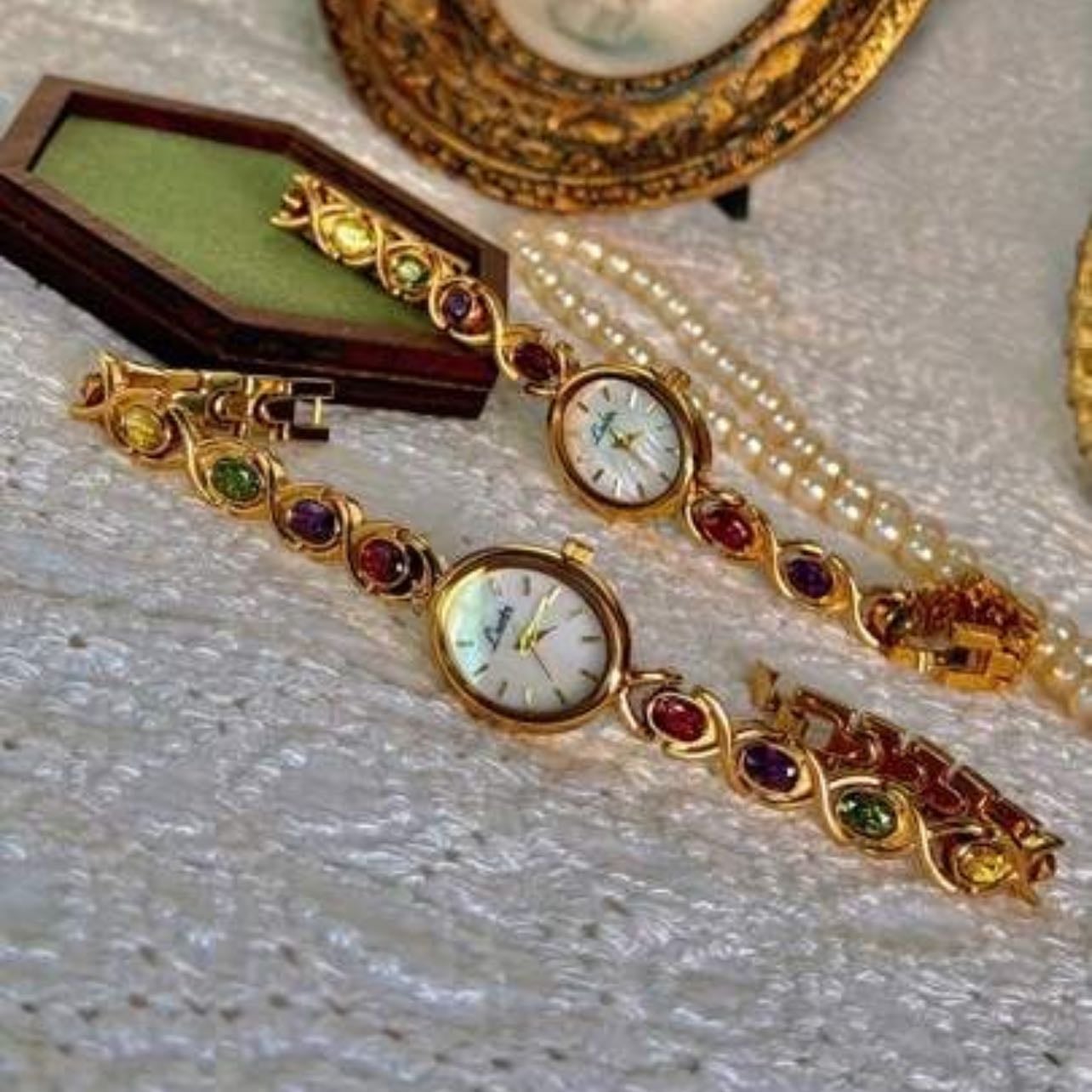 Gold Watch with colored rocks