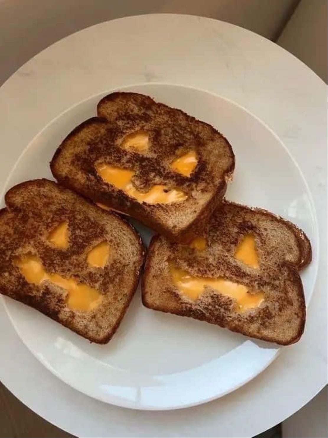 Jack-o’-lantern grilled cheese