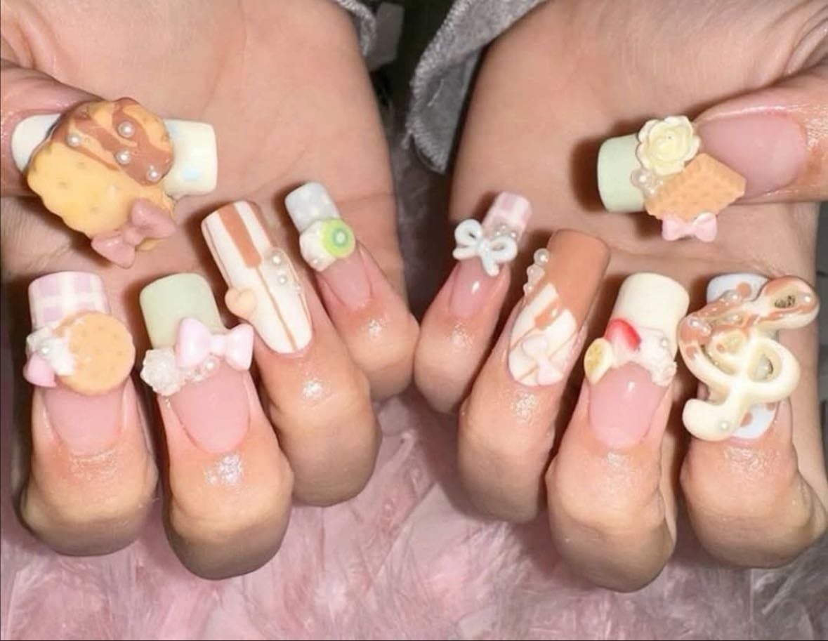nails with cute charms ⋆.𐙚 ̊ - nursing school man 😔