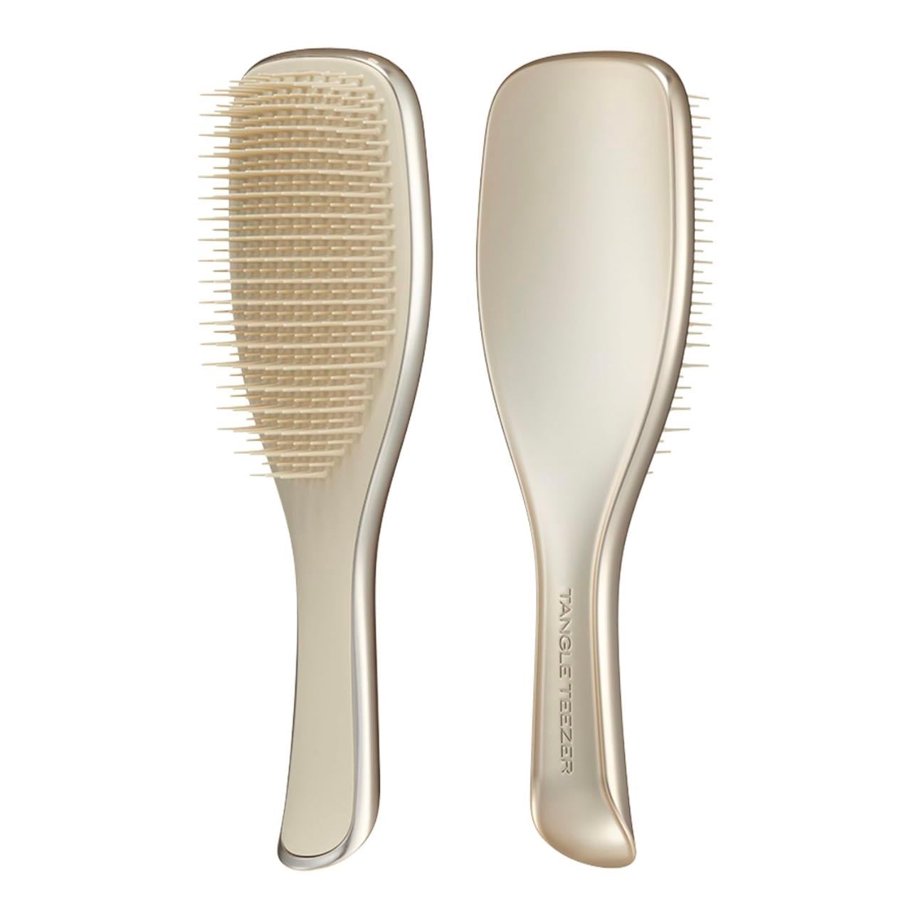tangle teezer The Ultimate Detangler Chrome - Our patented teeth have two-tiered technology with added flex for wet hair. The long, flexible teeth detangle, removing knots and reducing breakage, while the short teeth smooth, for glossy, frizz-free hair.
