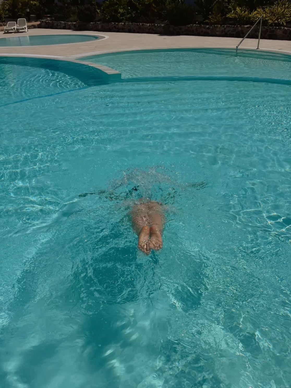 jumping in a cold pool on a hot day