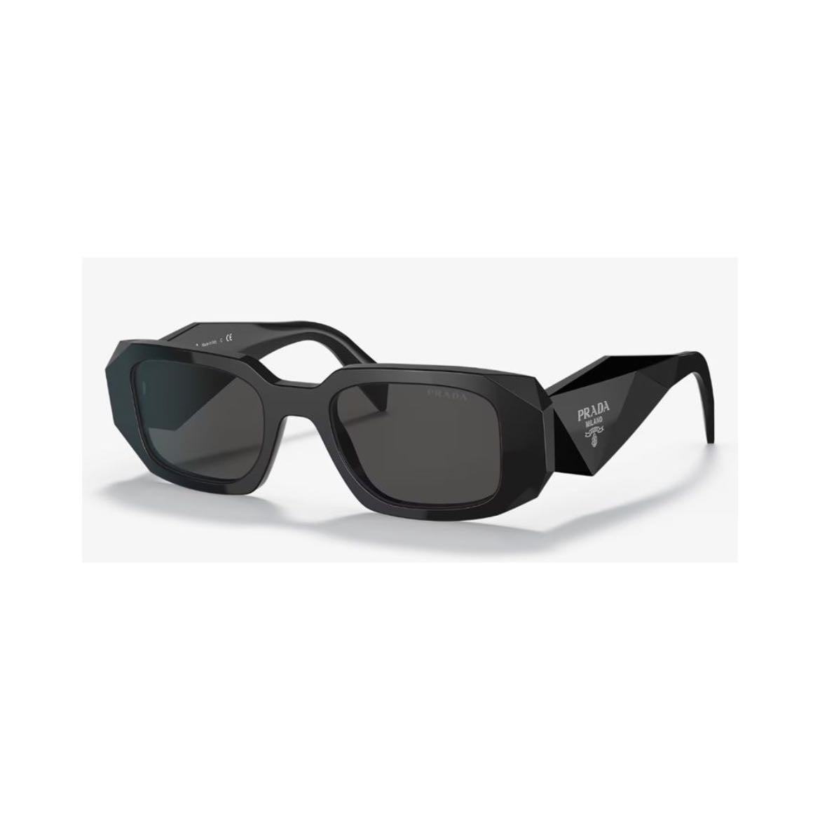 Prada Sunglasses - This are my favorite sunglasses and I use this every time