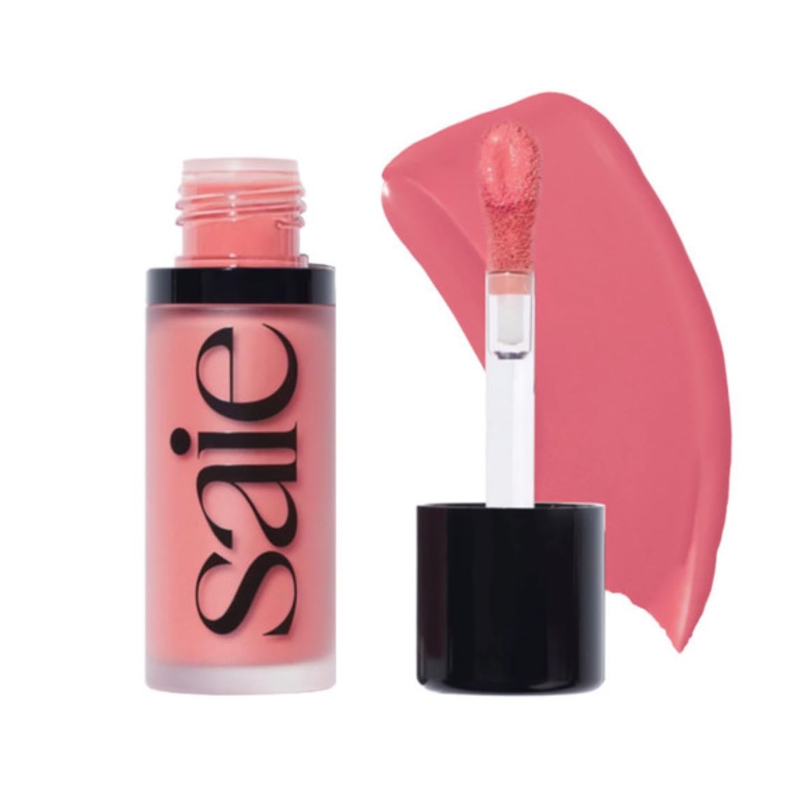 Saie Dew Liquid Blush for Cheeks - Hydrating Cream Blush Stick with a Blendable + Buildable Formula - Skincare Infused Dewy Cheek Tint for a Natural Flush - Glowy Makeup Essential - Sweetie (.40 oz) - Dew Blush is a vegan, liquid blush for cheeks that gives a natural flush of just-pinched color with a creamy, radiant finish. It comes with a chubby doe-foot applicator and lightweight formula that lets you create a natural cheek tint (or build up this glow blush for a deeper wash of color).