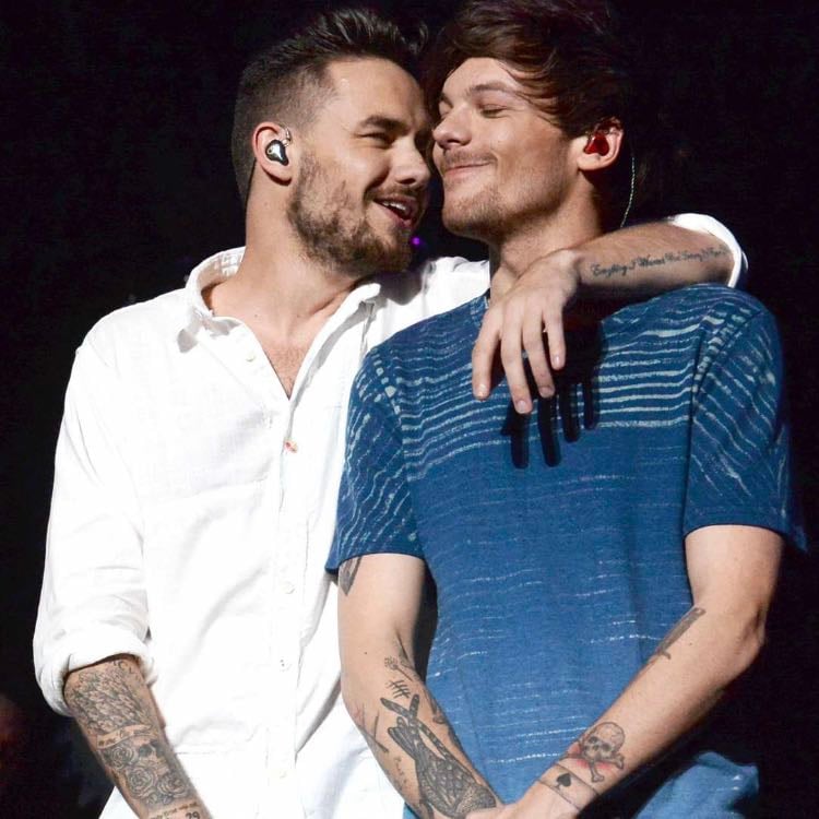 Liam and Louis - 4)These tow lads are always helping the other band mates and always throwing water at each other and is the funniest thing every 