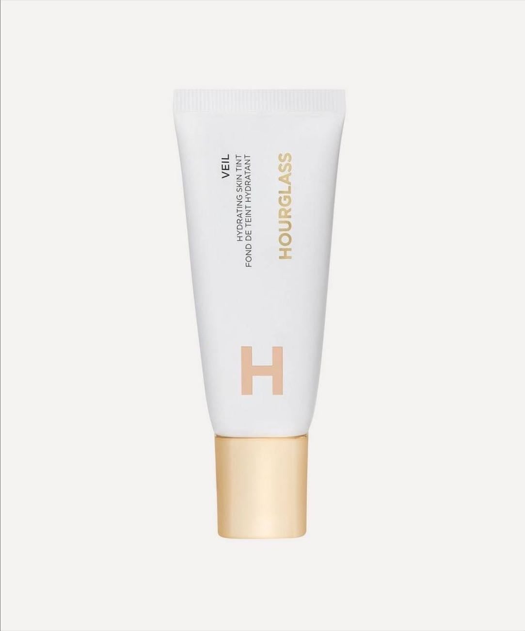 Hourglass skin tint - Light, glowy, and very natural skin finish. Not high coverage.
