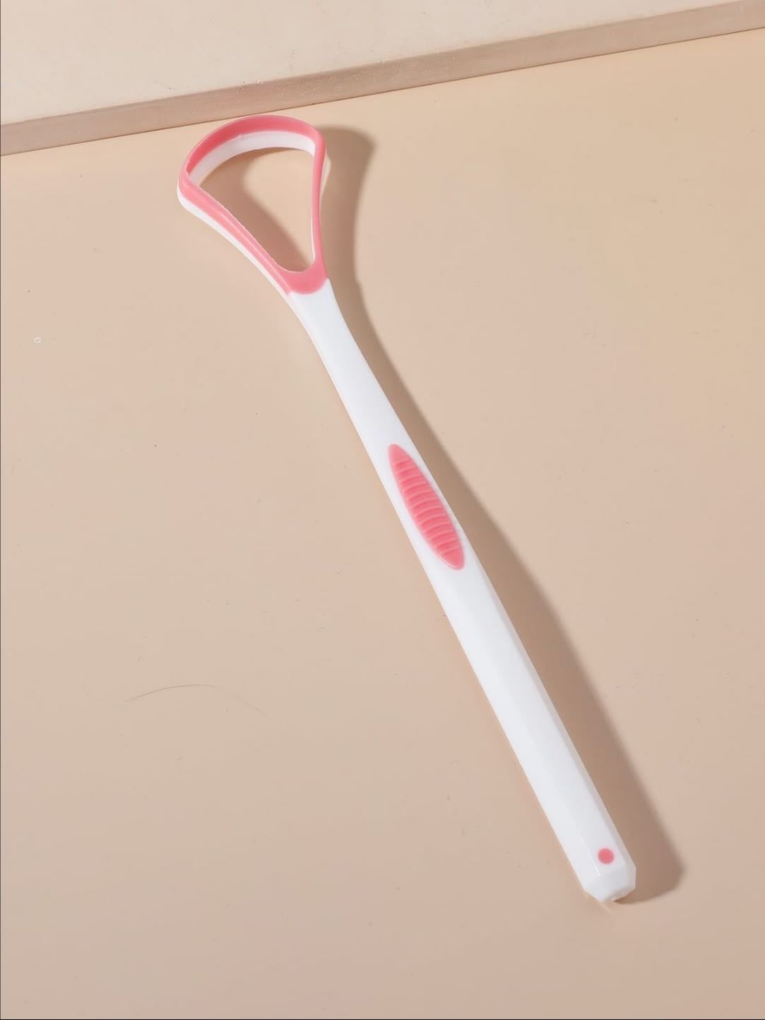 Tongue scraper