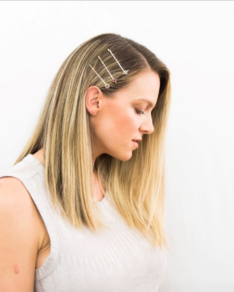 Sleek side part hairstyle