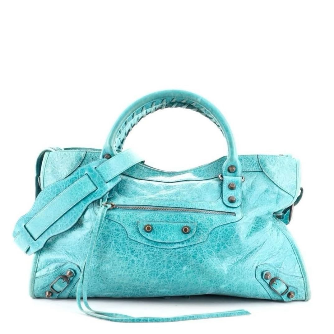 City bagggg - Un faux ou un du mm style mais en couleur rose ou turquoise ou sinon jsp mais ils sont tous beauxx