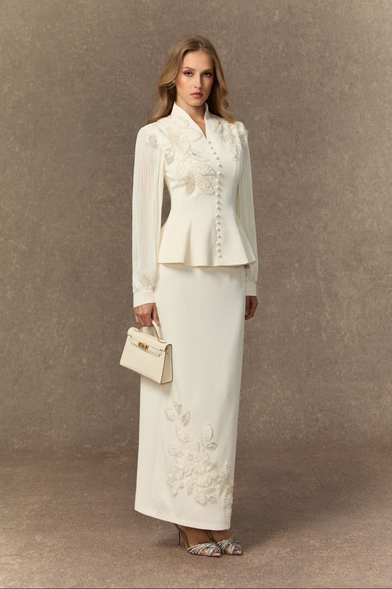A skirt set with pleated sleeves decorated with white floral embroidery. - Sunfere