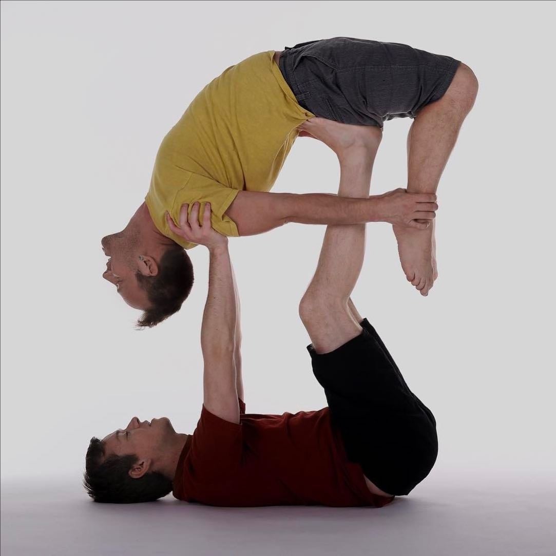 Trying yoga couple poses