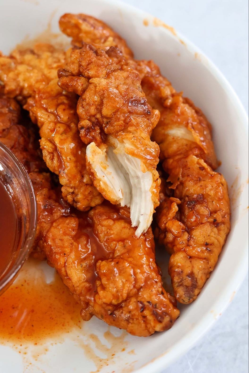 Hot honey chicken tenders and garlic fries
