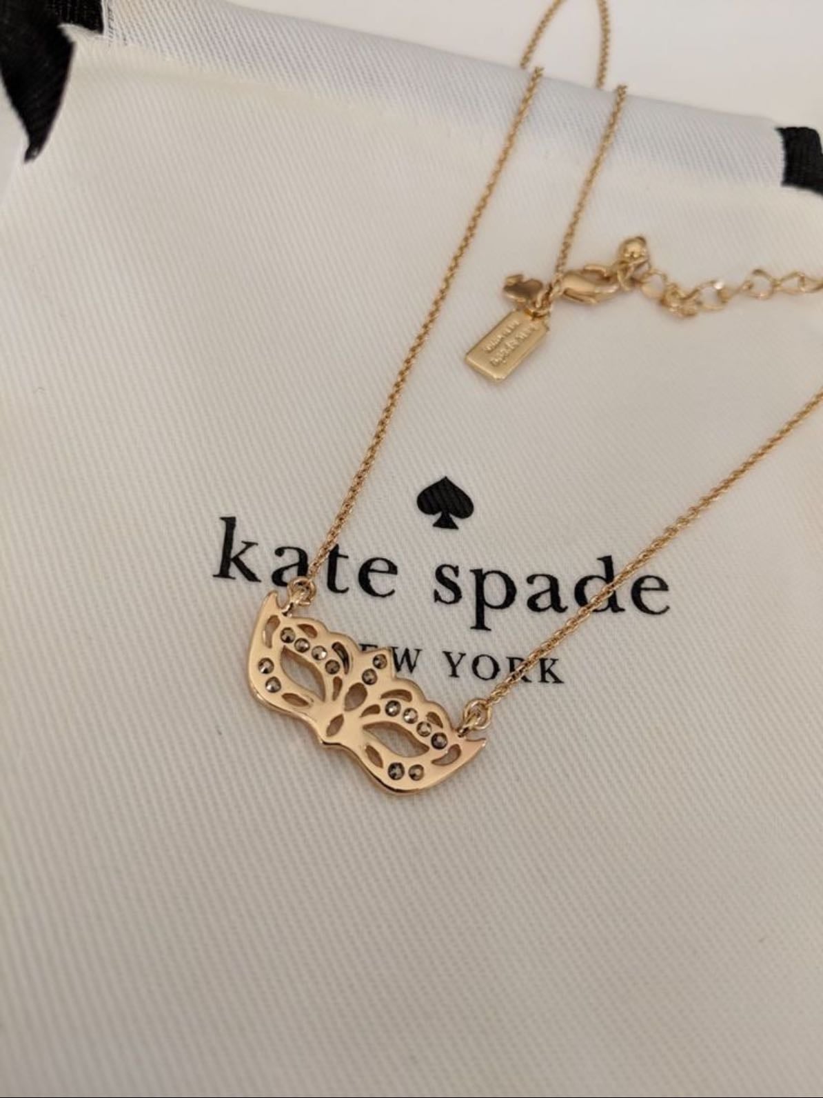 This mask necklace ౨ৎ - I don’t know if it’s from Kate’s spade thooo