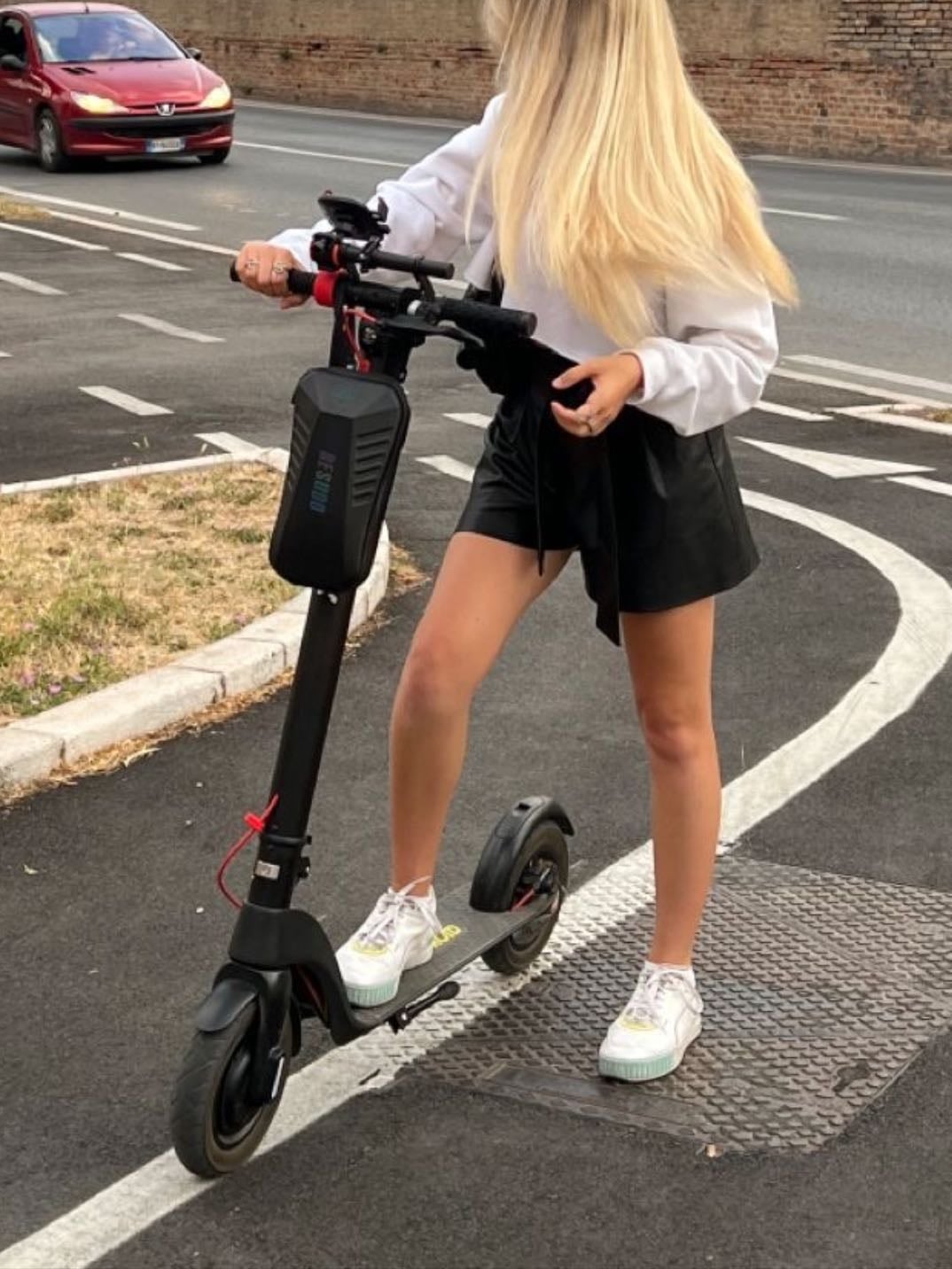 Ride a scooter around a city
