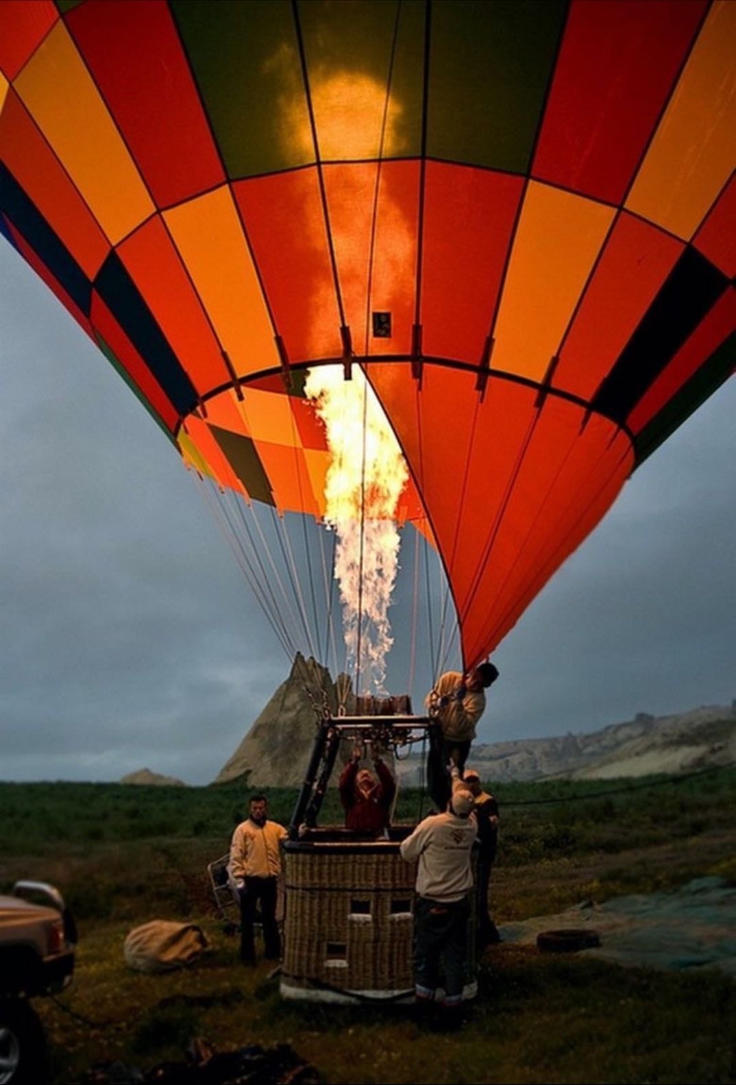 Hot air balloon launching at dawn